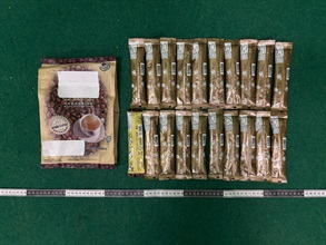 Hong Kong Customs today (October 11) detected one drug trafficking case involving an incoming air passenger at Hong Kong International Airport and seized about 15 kilograms of suspected ketamine, with an estimated market value of about $5.4 million. One female was arrested. Photo shows some of the coffee powder packages used to conceal the suspected ketamine in the case.