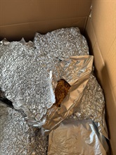 Hong Kong Customs detected a duty-not-paid manufactured tobacco smuggling case at the Shenzhen Bay Control Point yesterday (October 12). A total of about 8 000 kilograms of duty-not-paid manufactured tobacco, with an estimated market value of about $53.4 million and a duty potential of about $32 million, was seized from an inbound medium goods vehicle. A male local driver involved in the case was arrested. Photo shows the duty-not-paid manufactured tobacco seized.