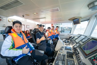 Hong Kong Customs organised the Customs YES Youth International Engagement Tour to Macao on October 11 and 12. Photo shows Customs YES members and members of "Jovens Protectores do Original" visiting the Maritime Enforcement Department of Macao Customs and touring its fleet.