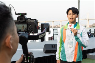 Hong Kong Customs organised the Customs YES Youth International Engagement Tour to Macao on October 11 and 12. Photo shows a Customs YES member being interviewed at the 36th World Customs Organization Asia/Pacific Regional Contact Points Meeting.