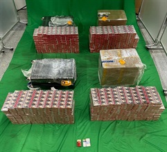 An incoming male passenger was sentenced to nine months' imprisonment and fined $2,000 by the West Kowloon Magistrates' Courts today (October 15) for importing duty-not-paid cigarettes and failing to declare them to Customs officers, in contravention of the Dutiable Commodities Ordinance. Photo shows the duty-not-paid cigarettes seized.