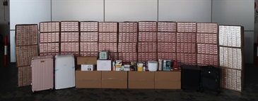 Hong Kong Customs detected three suspected smuggling cases involving ocean-going vessels in October. Large batches of suspected smuggled goods with a total estimated market value of about $23.6 million were seized. Photo shows some of the suspected smuggled goods seized.