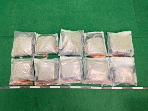 Hong Kong Customs (October 22) detected two drug trafficking cases involving incoming air passengers at Hong Kong International Airport today, and seized a total of about 8 kilograms of suspected cannabis buds with a total estimated market value of about $1.7 million. Two men were arrested. Photo shows the suspected cannabis buds seized in the first case.