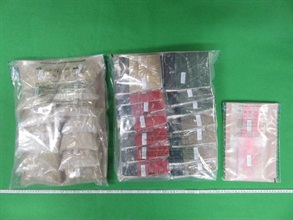 Hong Kong Customs seized a total of about 4 kilograms of suspected 3,4-methylenedioxymethamphetamine with an estimated market value of about $600,000 at Hong Kong International Airport and Chai Wan on January 4 and yesterday (January 9).