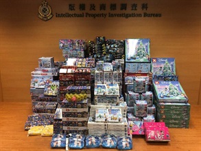 Anticipating that the sale of counterfeit goods would become more frequent during the Lunar New Year holiday, Hong Kong Customs has stepped up inspections and enforcement starting last week with a view to combating different kinds of counterfeit goods activities in town. Customs officers conducted special operations in Sham Shui Po and Tai Po yesterday (January 15) and seized about 6 900 items of suspected counterfeit goods, including red packets, toys and stationery with an estimated market value of about $170,000. Photo shows some of the suspected counterfeit goods seized.