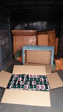 Some of the suspected illicit cigarettes found inside sofas.
