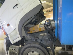 The smartphones found under the vehicle cab of the lorry.