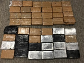 About 48 kilograms of suspected cocaine were seized from the container.