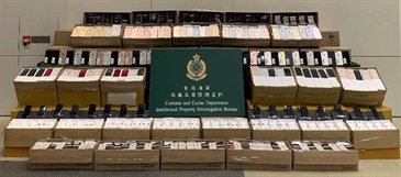 Hong Kong Customs seized a total of about 49 500 items of suspected counterfeit goods with an estimated market value of about $8.4 million in total at Man Kam To Control Point, Kwun Tong and Fanling on April 9 and yesterday (April 14). Photo shows some of the suspected counterfeit mobile phones and accessories seized.