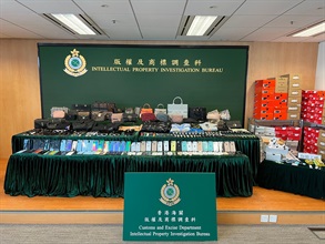 Hong Kong Customs conducted an eight-day operation codenamed "Tracer" from January 7 to 14 to combat counterfeit goods activities involving local delivery and cross-boundary transshipment. During the operation, Customs seized about 27 000 items of suspected counterfeit goods with an estimated market value of over $10 million. Two men and a woman were arrested. Photo shows some of the suspected counterfeit goods seized.