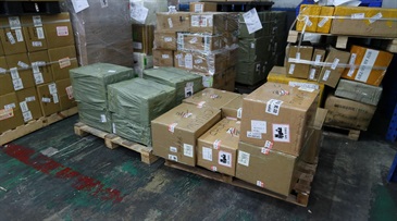 Hong Kong Customs conducted an eight-day operation codenamed "Tracer" from January 7 to 14 to combat counterfeit goods activities involving local delivery and cross-boundary transshipment. During the operation, Customs seized about 27 000 items of suspected counterfeit goods with an estimated market value of over $10 million. Two men and a woman were arrested. Photo shows some of the suspected counterfeit goods seized at a logistics company in Yuen Long.