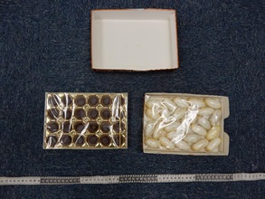 Suspected cocaine found inside snack boxes.