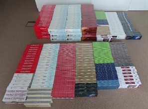 Hong Kong Customs seized a total of about 290 000 suspected illicit cigarettes with an estimated market value of about $800,000 and a duty potential of about $550,000 at Ngau Tau Kok and Shenzhen Bay Control Point on April 29 and May 2 respectively. Photo shows some of the suspected illicit cigarettes seized at Ngau Tau Kok.