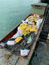 Hong Kong Customs yesterday evening (May 5) detected a suspected smuggling case using a cargo vessel and a barge in the waters off Hong Kong International Airport. About 160 tonnes of suspected smuggled frozen meat with an estimated market value of about $5.6 million were seized. Photo shows some of the suspected smuggled frozen meat seized on board a cargo vessel.