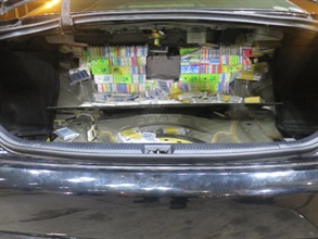 Smartphones concealed inside an altered compartment were seized by Customs.