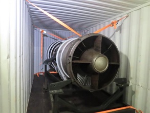 Hong Kong Customs seized about 217 kilograms of suspected cocaine with an estimated market value of about $246 million from a seaborne container at the Kwai Chung Customhouse Cargo Examination Compound on May 20. This is the first drug trafficking case making use of an aircraft engine uncovered by Customs. The amount of cocaine seized in the case is a record high for a seaborne case since 2012. Photo shows the engine stored inside the container.