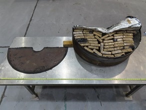 Hong Kong Customs seized about 217 kilograms of suspected cocaine with an estimated market value of about $246 million from a seaborne container at the Kwai Chung Customhouse Cargo Examination Compound on May 20. This is the first drug trafficking case making use of an aircraft engine uncovered by Customs. The amount of cocaine seized in the case is a record high for a seaborne case since 2012. Photo shows some of the suspected cocaine concealed inside one of the metal components.