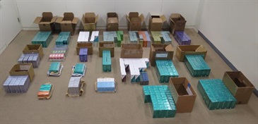 Hong Kong Customs mounted a territory-wide anti-illicit cigarette operation codenamed "Eagle" from May 1 to yesterday (May 28) to combat illicit cigarette activities on all fronts, including cross-boundary smuggling, storage and distribution as well as peddling, through a multi-pronged enforcement approach. During the operation, Customs detected a total of 94 cases and seized about 3.5 million suspected illicit cigarettes and about 1 million suspected illicit heat-not-burn (HNB) products with an estimated market value of about $12 million and a duty potential of about $8.5 million. Sixty-one men and 13 women aged between 15 and 81 were arrested, among which 22 were illicit cigarette sellers and 25 were buyers. Photo shows some of the suspected illicit cigarettes seized in one of the smuggling cases.