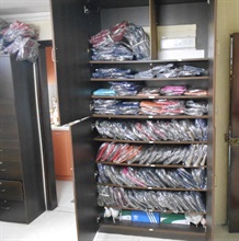 Hong Kong Customs yesterday (June 10) conducted a special operation in Kowloon Bay and Mong Kok to combat the sale of counterfeit goods and seized about 2 800 items of suspected counterfeit goods with an estimated market value of about $1.4 million. Photo shows some of the suspected counterfeit goods found at a storage centre in Mong Kok.