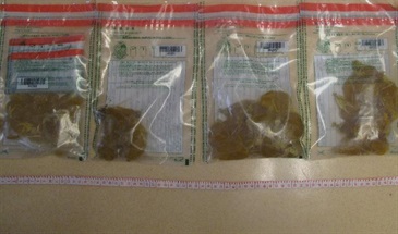 Some of the packets of liquid-form cocaine seized.