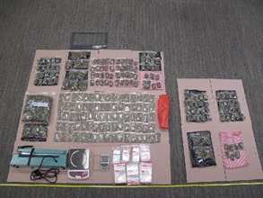 Suspected cannabis buds and packing paraphernalia seized by Customs.