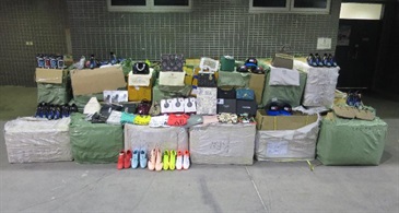 Hong Kong Customs mounted a five-month special operation codenamed "Wave II" from January 25 to yesterday (June 25) to combat smuggling of contraband items by cross-boundary goods vehicles in view of the drastic drop of cross-boundary passenger flow between the Mainland and Hong Kong amid the COVID-19 epidemic. A variety of smuggled goods and prohibited items worth over $66 million were seized, with arrests of 196 people. Photo shows some suspected counterfeit goods seized.