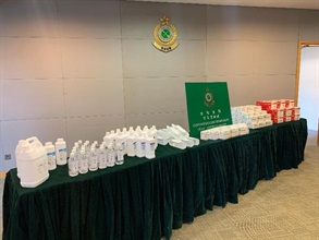 Hong Kong Customs launched a large-scale territory-wide special operation codenamed "Guardian" since January 27 this year to conduct spot-checks and enforcement operations against common protective items. More than 5 300 officers have been mobilised to conduct over 35 000 inspections at retail spots. Investigations have been conducted against 13 cases of suspected violations of the Trade Descriptions Ordinance and 11 cases of suspected violations of the Consumer Goods Safety Ordinance. Sixty-one persons have been arrested so far and goods suspected of violating the law including nearly 124 000 surgical masks, 306 bottles of disinfectant alcohol and 23 bottles of normal saline have been seized. Photo shows some of the goods suspected of violating the law seized.